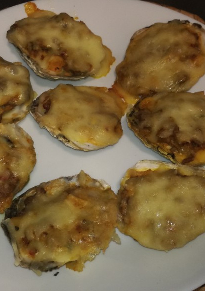 Una foto de Ostras gratinadas con mixto de carne y marisco