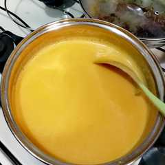 Una foto de Crema de zanahoria y calabaza con leche en polvo