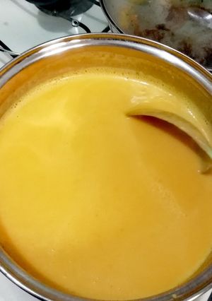 Una foto de Crema de zanahoria y calabaza con leche en polvo