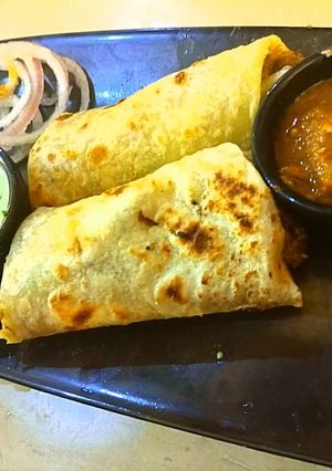 A picture of Afghani chicken kabab wraps with signature tomato chutney 💕.