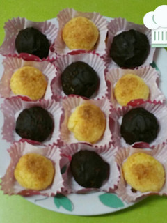 Una foto de Coquitos de coco con toque de naranja y chocolate