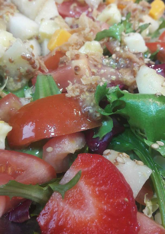 Una foto de Ensalada de pera, queso y nueces