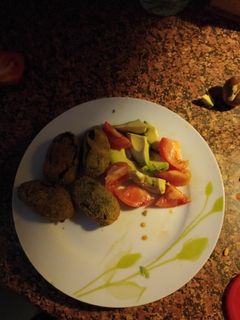 Una foto de Croquetas de Calamares en su Tinta