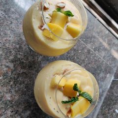 A picture of Mango dryfruits smoothie.