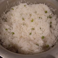 A picture of White Rice with Green Peas🍚.