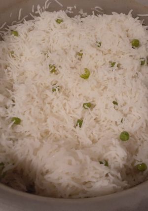A picture of White Rice with Green Peas🍚.