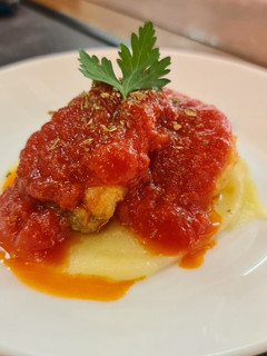 Una foto de Bacalao con tomate y base de crema de patata