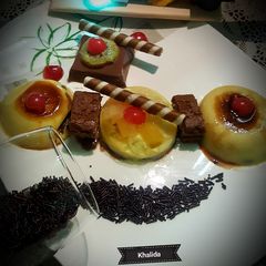 A picture of FruityJello Dome upside Down Egg Pudding & Chocolate Mousse.