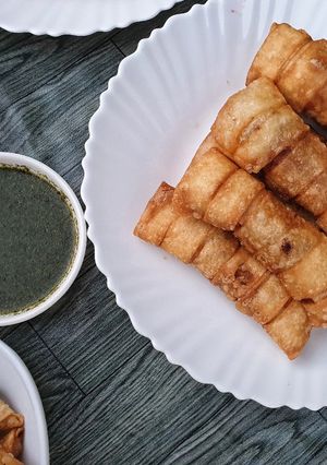 A picture of Buffalo hot sauce rolls.
