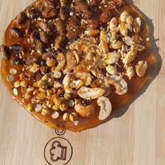 A picture of Mixed nuts chikki pizza (chizza).