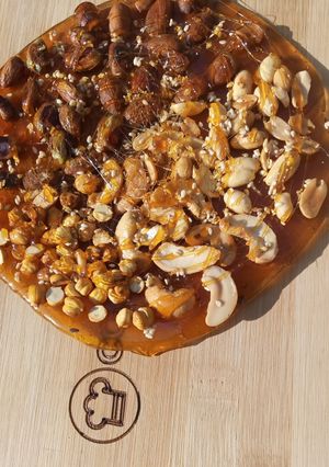 A picture of Mixed nuts chikki pizza (chizza).