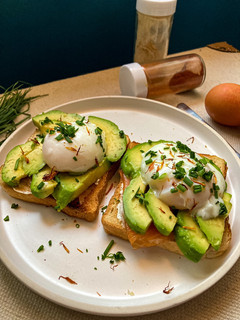 A picture of Avocado Toast with Poached Egg.