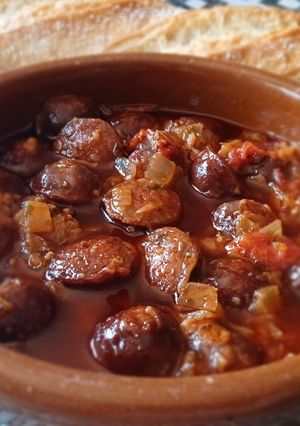 A picture of Stewed Spicy Mini Chorizos.