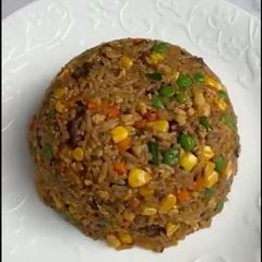 A picture of Fried Rice with Leftover Lamb Skewers.
