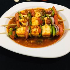 A picture of Paneer Shashlik With Gravy.