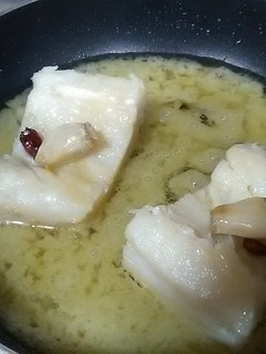 Una foto de Bacalao al pil pil