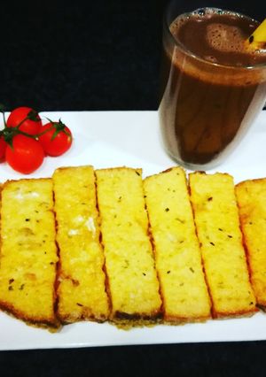 Foto principal de Pan Rustik Bakery bañado en huevo con aderezo de algas