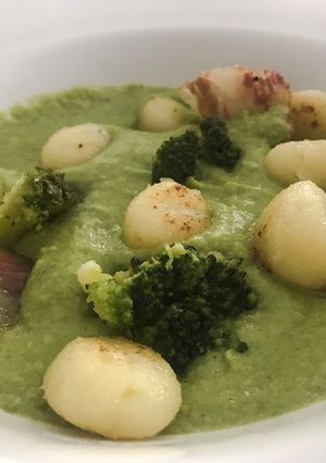 A picture of Crispy Potato Gnocchi with broccoli cream and guanciale.