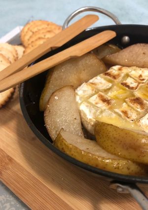 A picture of Baked Camembert with Caramelised Onions, Bacon and Pears.