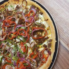 A picture of Cheeseless pizza.