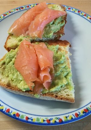 A picture of Bruschetta with Smoked Salmon and Avocado Sauce.
