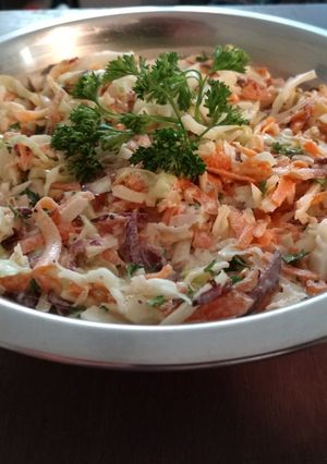 A picture of Cabbage and carrot slaw.