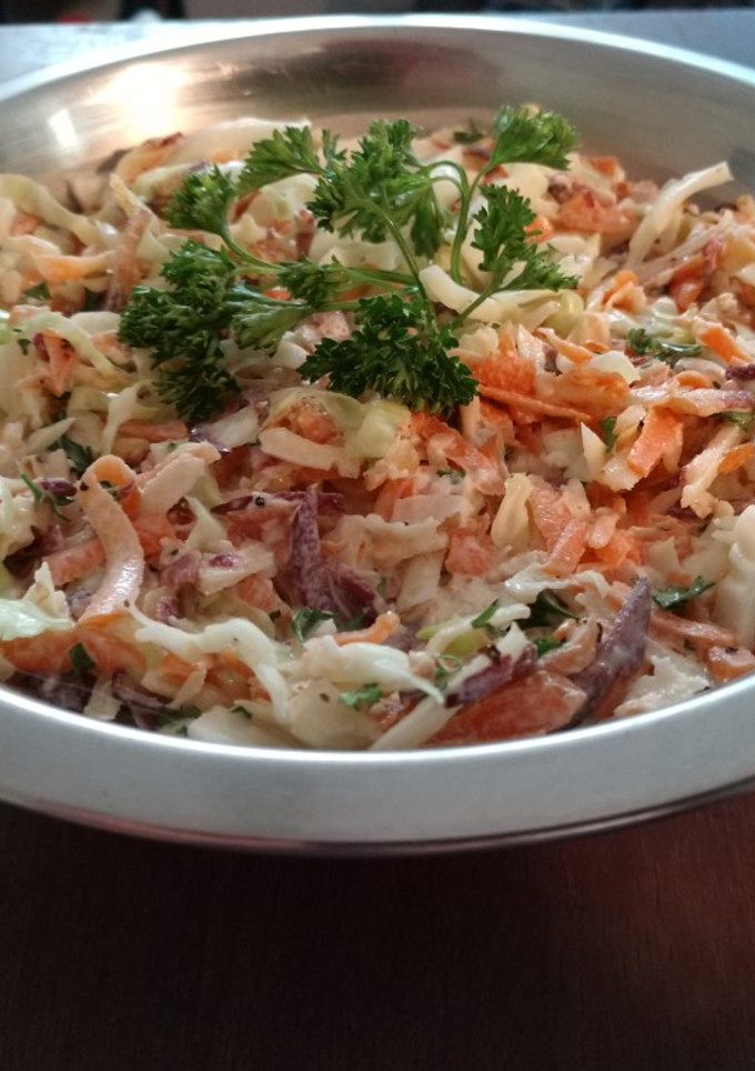 A picture of Cabbage and carrot slaw.