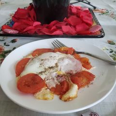 Egg 🥚 with tomato 🍅 A picture of Egg 🥚 with tomato 🍅.