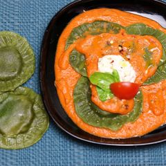 Spinach Ricotta Ravioli In Tomato Cream Sauce A picture of Spinach Ricotta Ravioli In Tomato Cream Sauce.