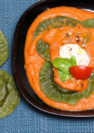 A picture of Spinach Ricotta Ravioli In Tomato Cream Sauce.