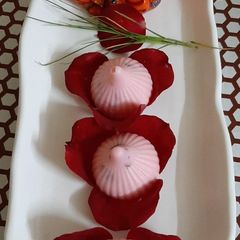 A picture of Gulkand stuffed Strawberry Chocolate Modak.