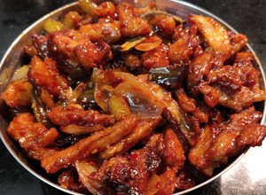 A picture of Crispy Honey Chilli Potatoes.