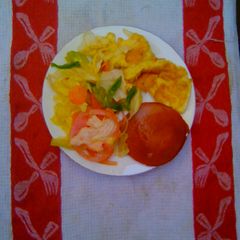 A picture of Green salad eggs chicken polone.