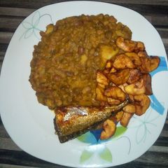 A picture of Porridge beans & sweet potatoes with dodo & fish.