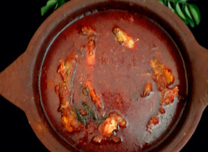A picture of Kerala sardine fish curry.