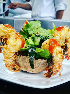 Una foto de Camarones al Coco en Salsa Mango - chipotle