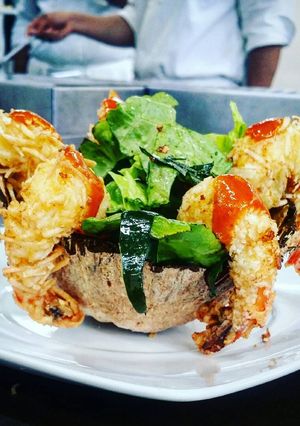 Una foto de Camarones al Coco en Salsa Mango - chipotle