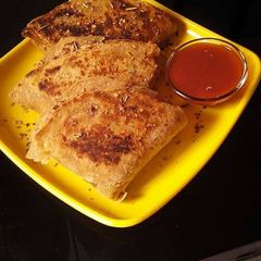A picture of Triangle Roti Pizza.