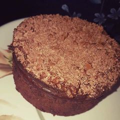 A picture of Eggless chocolate cake in pressure cooker.
