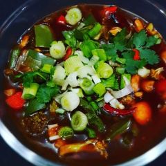 A picture of Veggies hot garlic soup.
