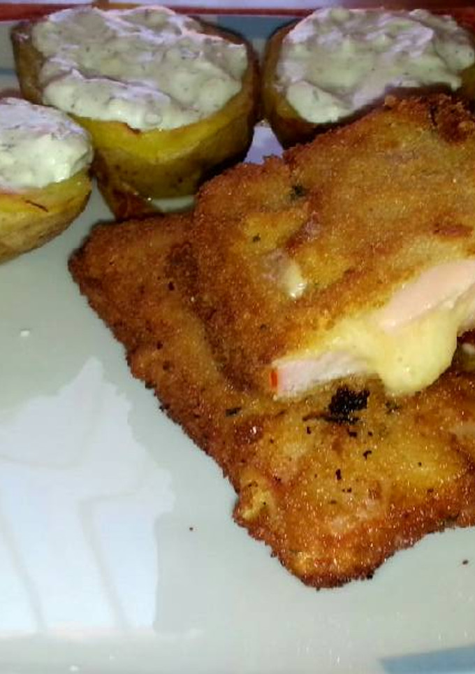 Una foto de San Jacobo con queso feta