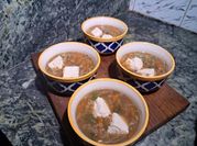 A picture of bean soup with oregano