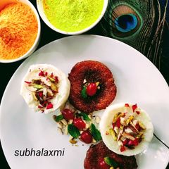 A picture of Phirni cake with mini carrot malpua.