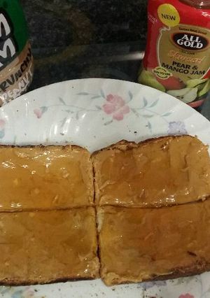 A picture of Peanut butter and jam toast.