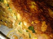 Una foto de lasaña de acelga y pollo