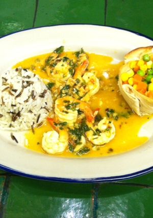 Una foto de Camarones con ajo y perejil