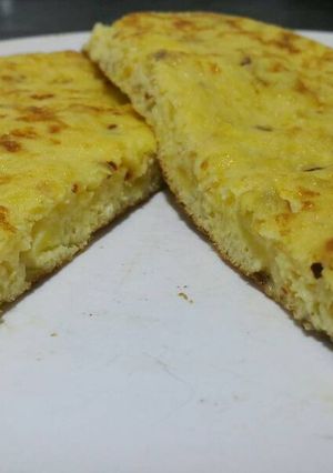 A picture of Omelette with cheese and sweet potato.