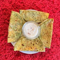 A picture of Maharashtrian sweet dish Puran Poli with kheer.