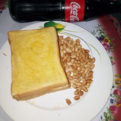 A picture of Buttered Toasted Bread with Peanut.