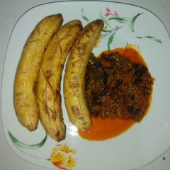 A picture of Bole and scented leave sauce.